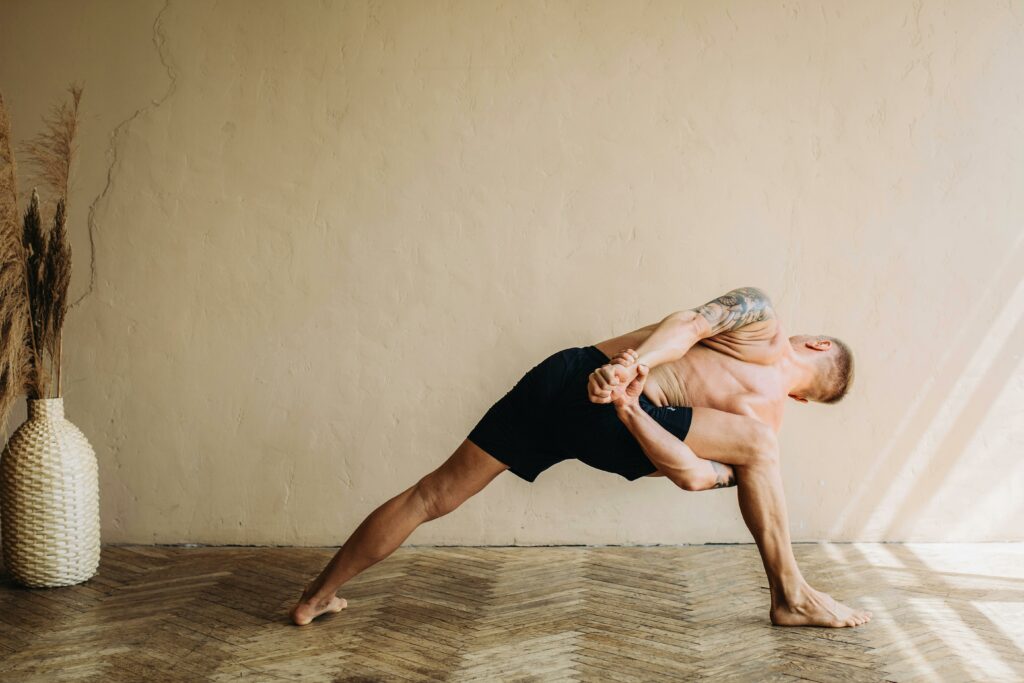 man in yoga position