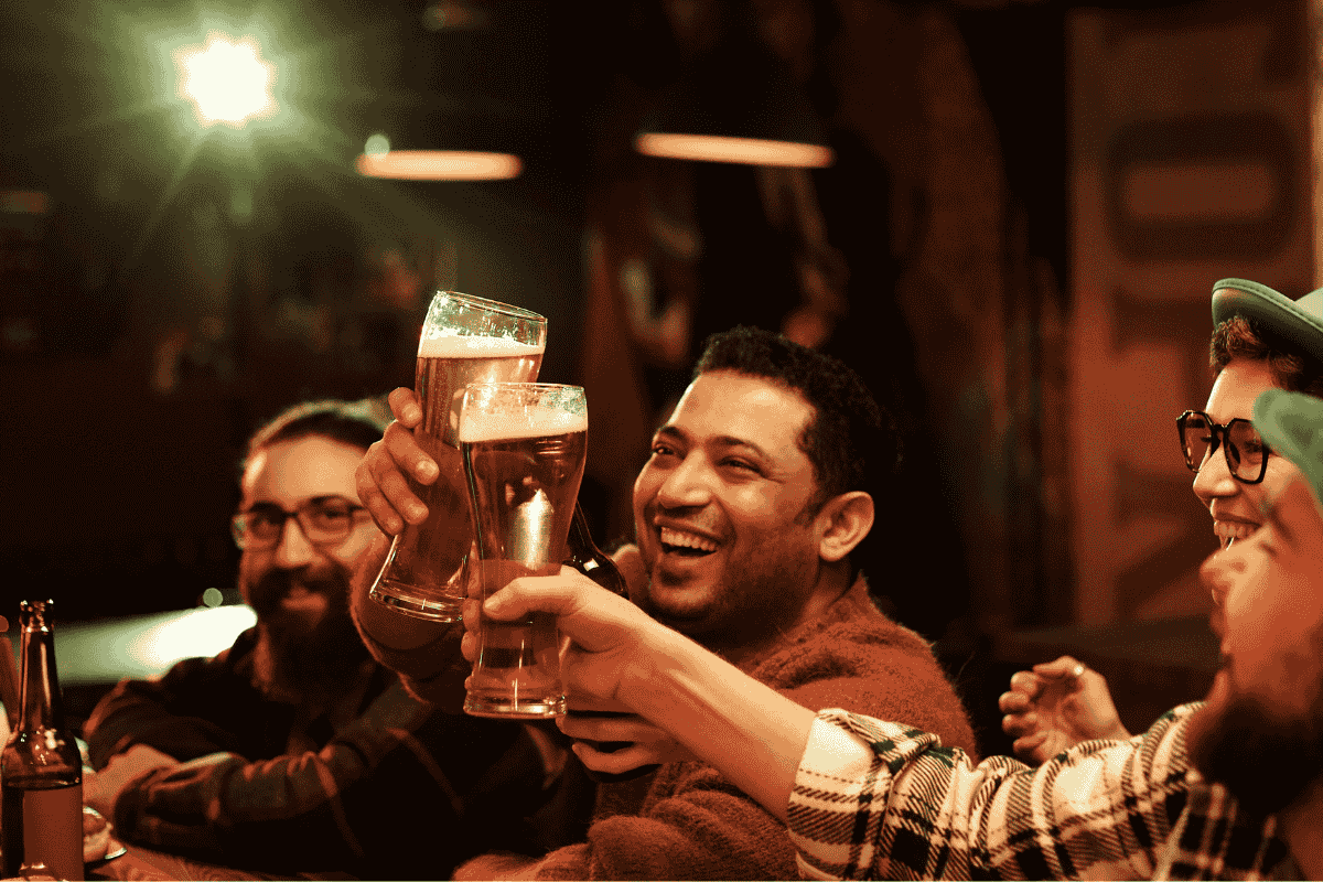 men drinking in a bar