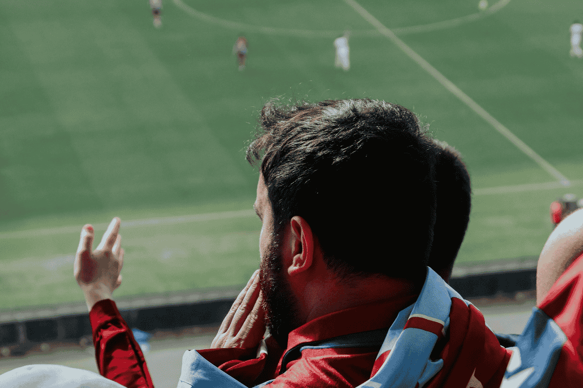 man-watching-a-footbal-game